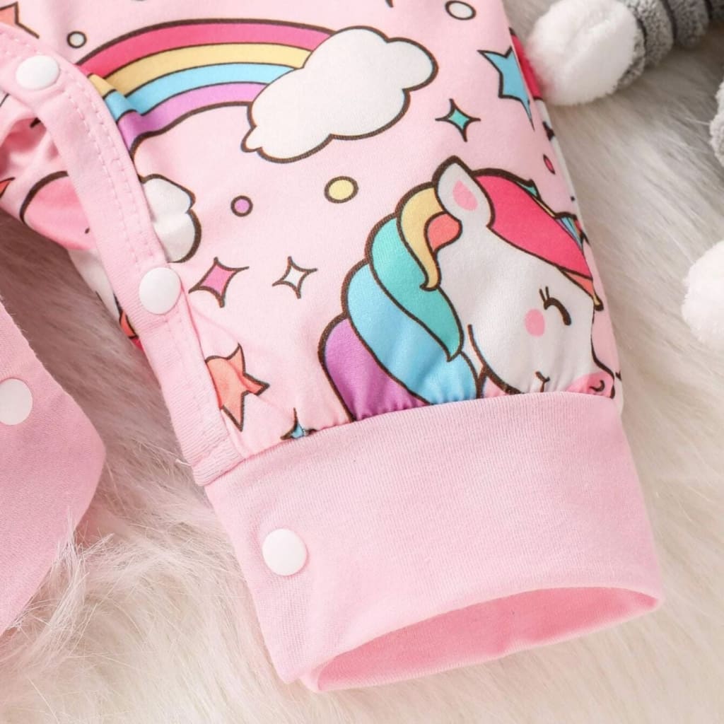 Enterito tono rosa con estampado de unicornio y lazo para el cabello | Bodys para bebés