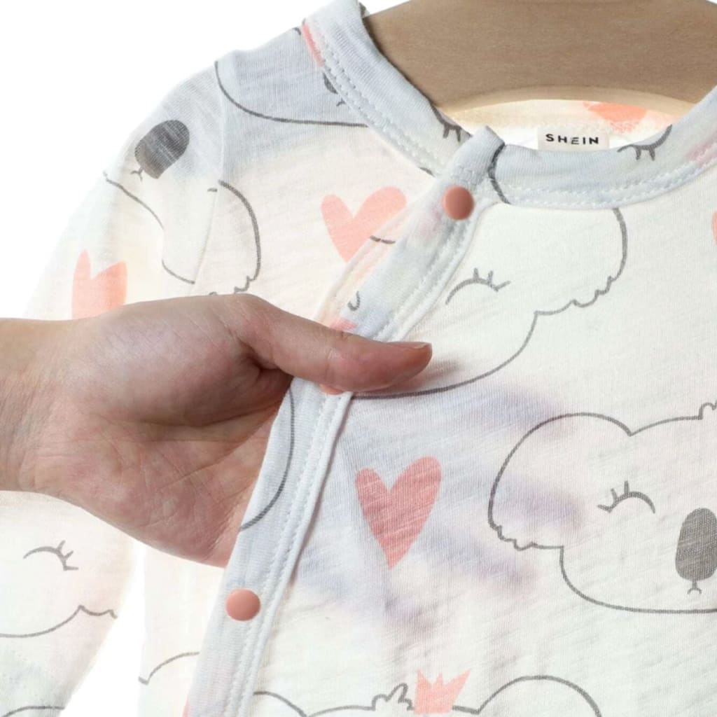 PIjama de bebé con estampado de koala en tono rosa | Pijamas y saquitos para bebés